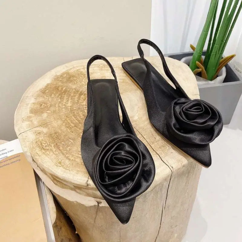 Black satin floral embellished slingback flats with rose accents for elegant pink satin floral embellished style