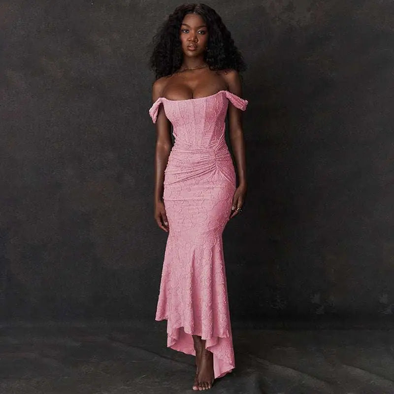A pink ruched bodycon fit mermaid-style gown with off-the-shoulder straps and a high-low hemline for evening wear