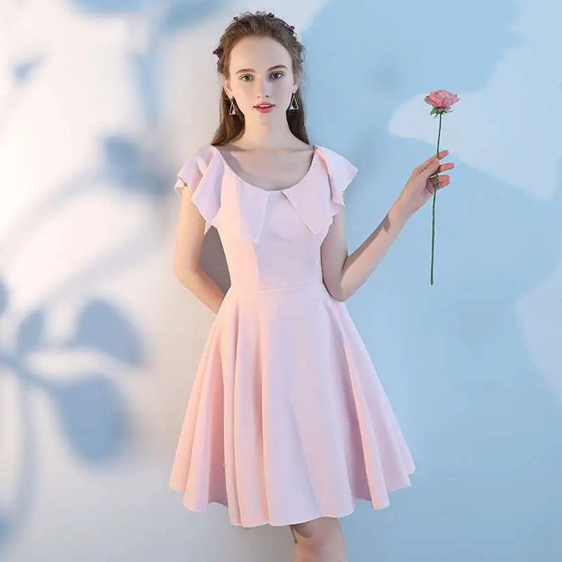 A soft pink short sisters shoulder ruffled dress with sleeveless square neckline and flared skirt made design