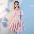 Pink short sisters soft pink off-the-shoulder dress with layered shoulder ruffles and a flared skirt made of lightweight fabric