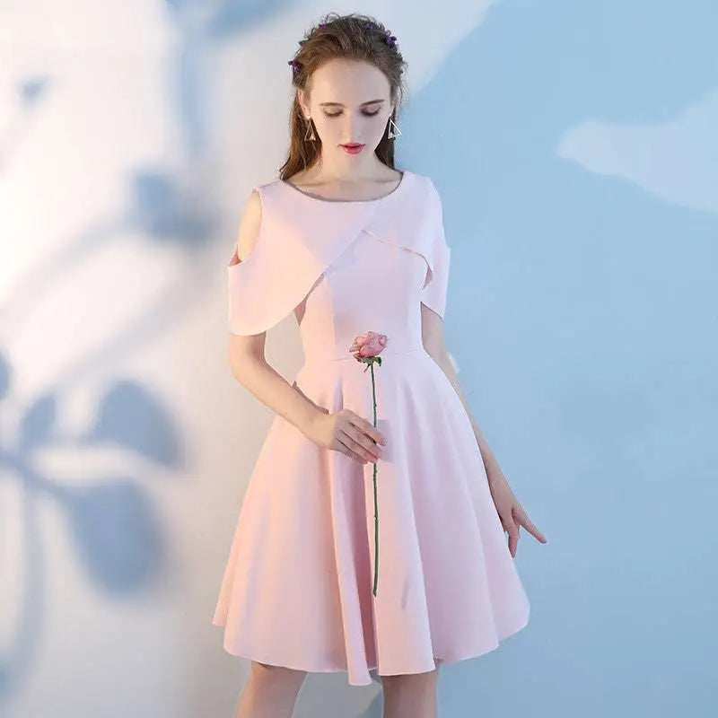 Soft pink pink short sisters off shoulder shoulder ruffled dress with fitted bodice and flared skirt made of lightweight fabric