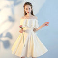 Ivory satin pink short sisters off shoulder shoulder ruffled dress with ruffled bodice and flared skirt made