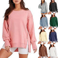 Pink solid oversized sweatshirt crew with a relaxed fit and side zipper detail featuring a crew neck design
