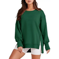 Dark green oversized sweatshirt crew with side slits and a relaxed fit, contrasting the pink solid oversized crew neck design