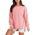 Pink solid oversized sweatshirt with crew neck design and side zippers for a relaxed fit and casual wear