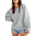 A soft heather gray oversized sweatshirt crew with relaxed fit ribbed cuffs and crew neck design with side zippers