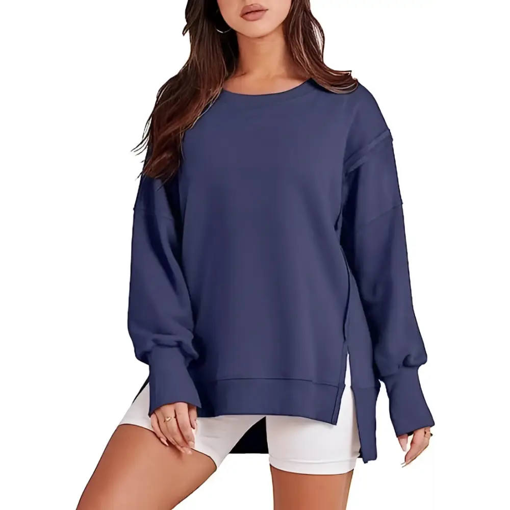 Navy blue oversized sweatshirt crew neck design with side slits and ribbed cuffs in a pink solid oversized style