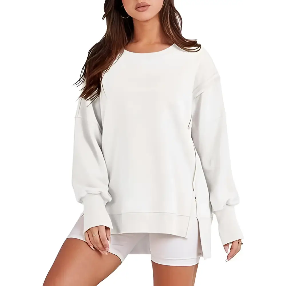 White oversized sweatshirt crew with relaxed fit side slits and crew neck design for casual wear