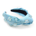 Light blue knotted holiday party headband with clear and light blue star embellishments from pink star solid collection