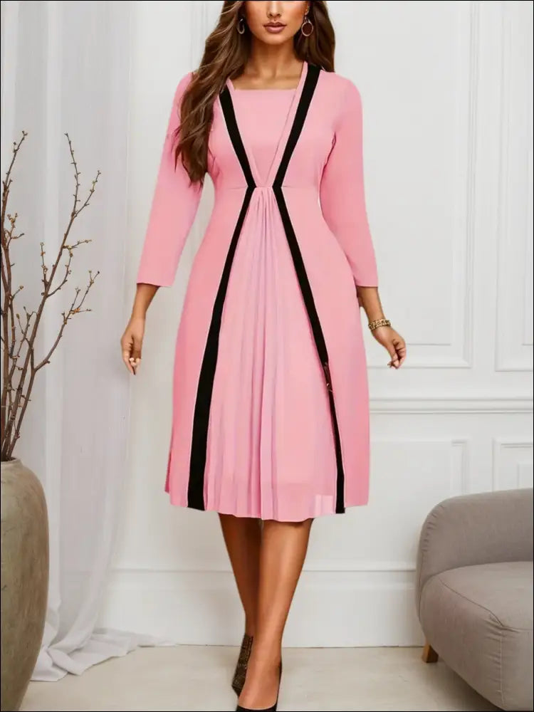 Pink striped pleated midi dress with soft pink fabric black vertical pleated panels and v-neckline in luxury women’s fashion