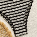 Black and white striped printed swimsuit bikini split set bottom with a textured woven pattern visible from the back side