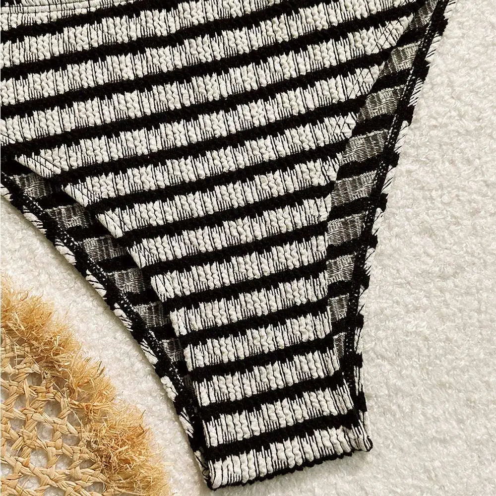 Black and white striped printed swimsuit bikini split set bottom with a textured woven pattern visible from the back side