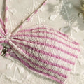 Pink and white striped textured woven bikini split set top featuring a bow detail for a striped printed swimsuit