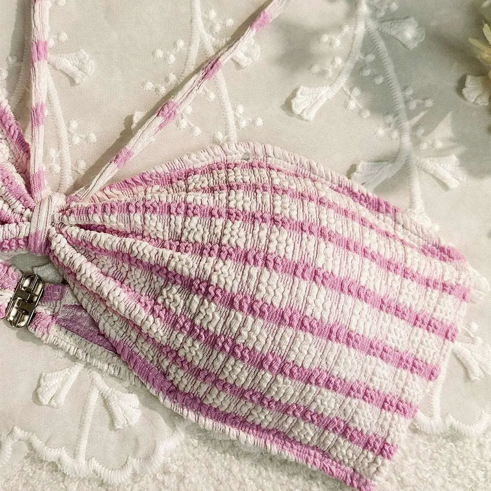 Pink and white striped textured woven bikini split set top featuring a bow detail for a striped printed swimsuit