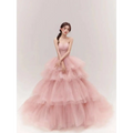 A soft pink tiered tulle dress with a strapless bodice from the fairy temperament main collection
