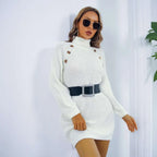 White knit sweater dress with brown buttons and black belt featuring silver buckle in pink winter turtleneck style