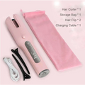 Pink wireless automatic curler with usb lcd screen silver accents and black clips for styling hair