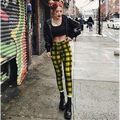 Yellow and black plaid women’s high-waist stretch leggings showcasing a high-waist fit and stretchy fabric in a 3 pack