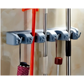 Light gray plastic mop hook wall mounted wall hanging organizer rack holding cleaning tools