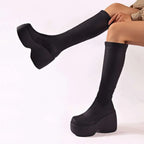 Black platform knee high elastic leather boots with sleek stretchy upper and thick chunky sole for stylish wear