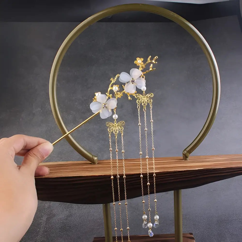 Elegant gold-toned plum blossom ancient style hairpin with translucent floral charms and pearl crystal chains for hanfu hair accessories