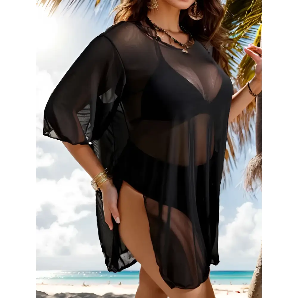 Plus size blouse bikini swimsuit cover up in black sheer mesh with wide flutter sleeves and a high slit