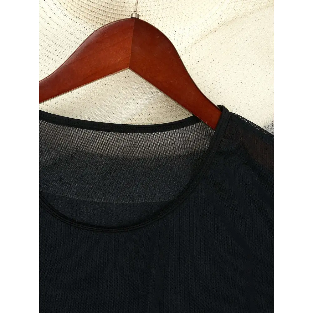 Plus size blouse bikini swimsuit cover up in black sheer mesh with a solid fabric body and semi transparent overlay
