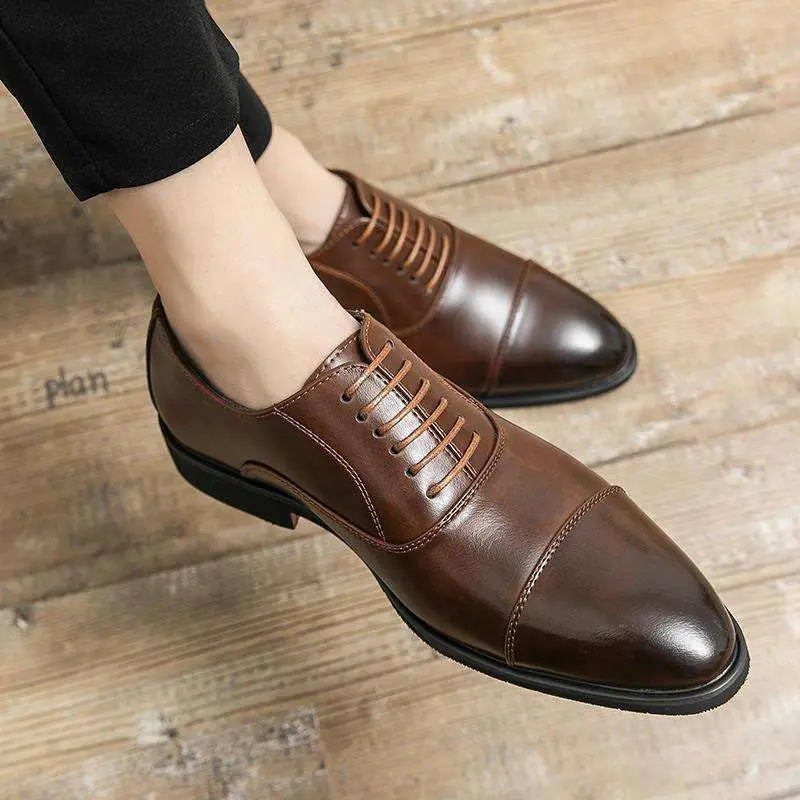 Brown leather plus size casual shoes featuring tan laces and classic cap toe oxford design for formal wear