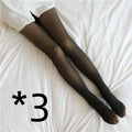 Plus size black fake translucent fleece lined tights worn with a white shirt for warmth and style