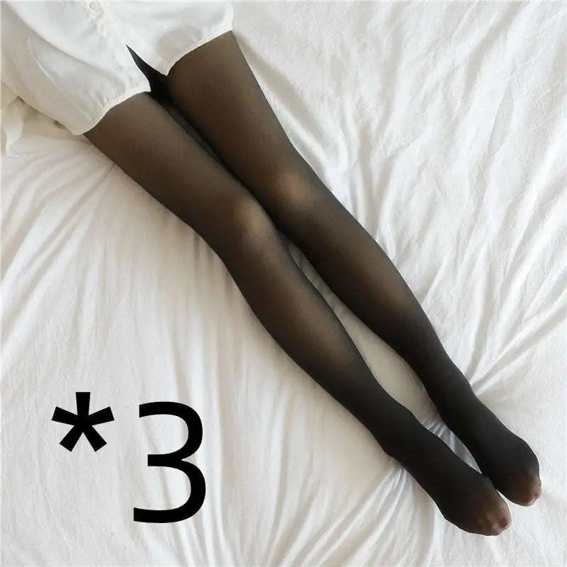 Plus size black fake translucent fleece lined tights worn with a white shirt for warmth and style