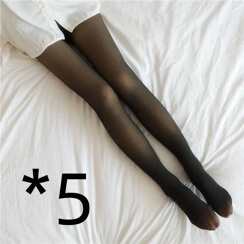Plus size black fake translucent fleece lined tights worn with a white shirt showcasing warmth and style