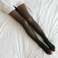 Plus size black sheer fake translucent fleece lined tights worn with a white shirt for stylish warmth and comfort