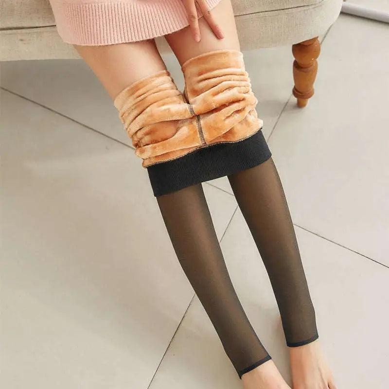 Plus size fleece lined tights featuring warm tan faux fur with black sheer mesh overlay and ribbed cuffs