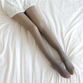 Plus size gray fake translucent fleece lined tights worn over legs showcasing warmth and style