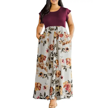 A plus size dress featuring a floral boho ruffle sleeve maxi dress with maroon top and gray floral skirt