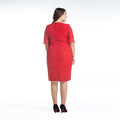 A vibrant red plus size lace quarter sleeve dress with three quarter sleeves and a fitted midi silhouette
