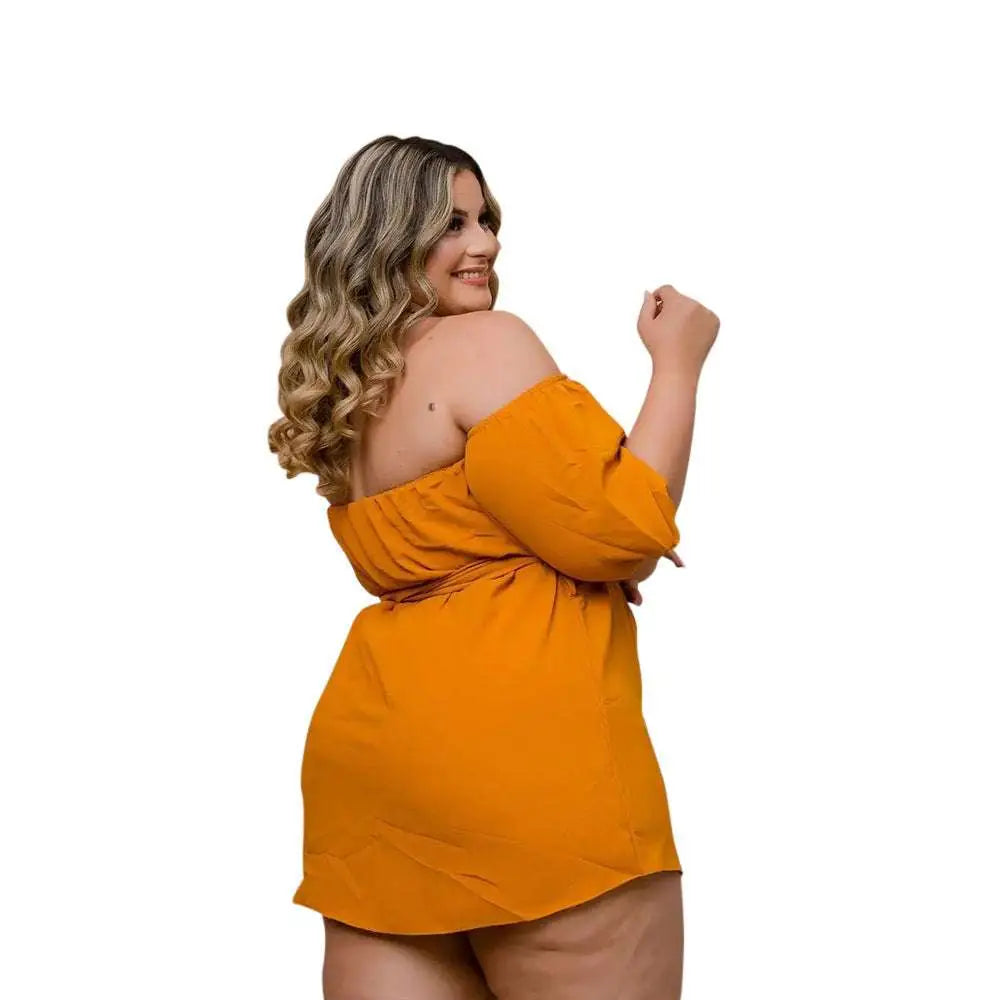 A vibrant orange off-the-shoulder dress with puffed sleeves and tied waist paired with plus size ladies comfort stretch shorts