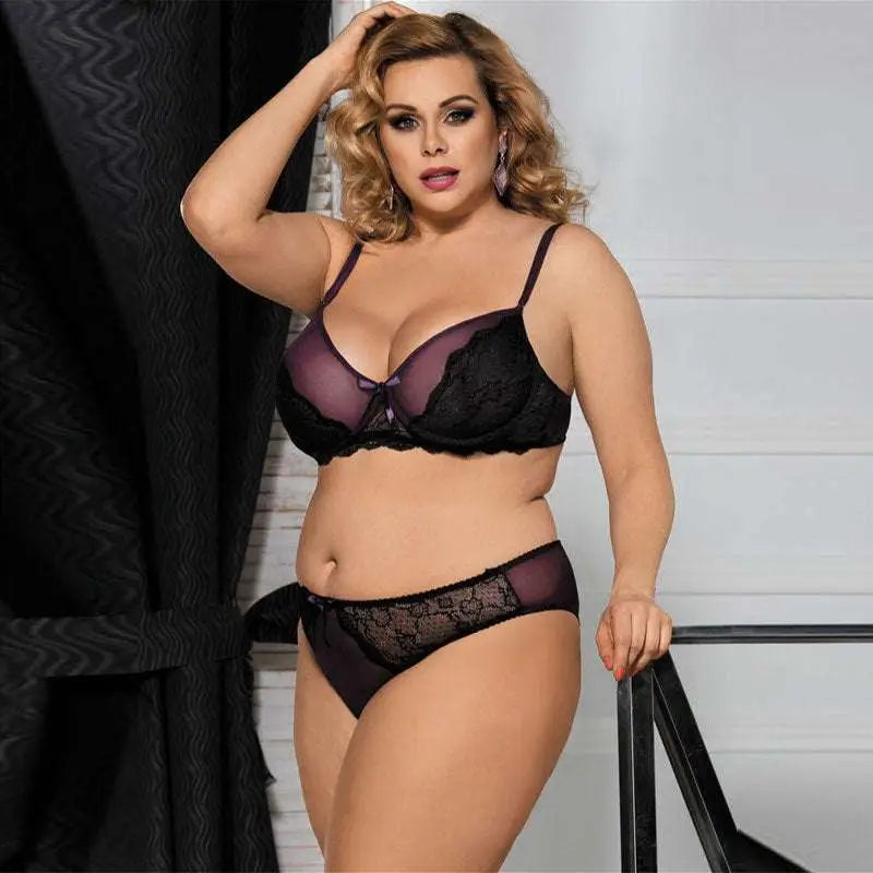 Plus size ladies sexy lingerie lace set featuring black lace bra and thong with sheer purple mesh panels