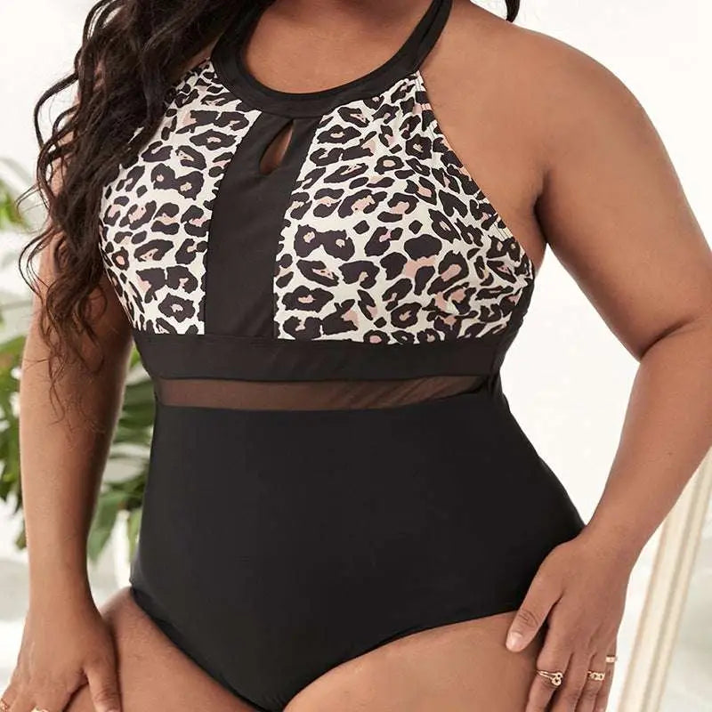 Plus size leopard print mesh one piece swimsuit with black and white pattern sheer mesh panel and halter neckline