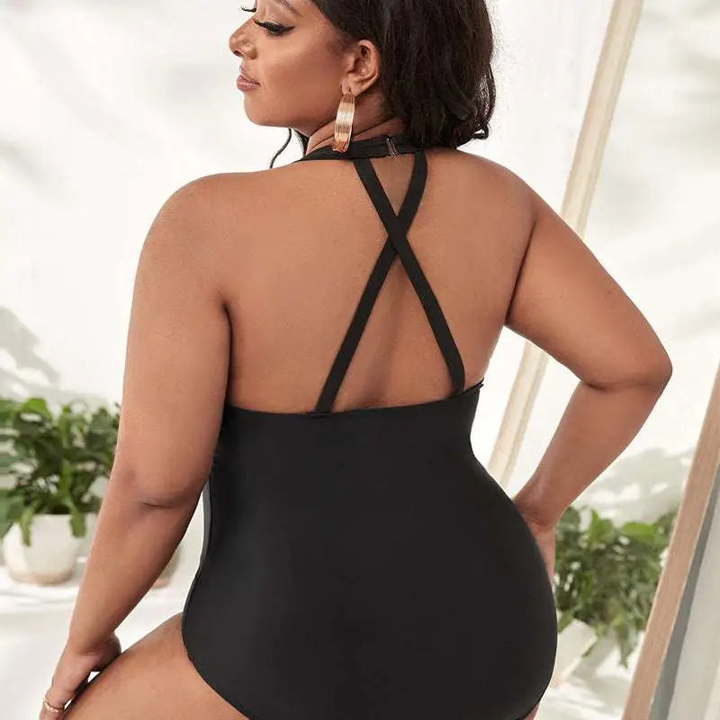 Black plus size leopard print mesh one-piece swimsuit with a sheer mesh panel and crisscross back design