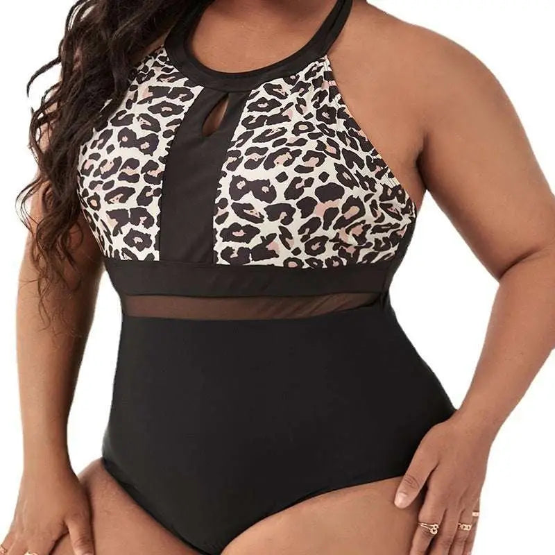 Plus size leopard print mesh one piece swimsuit in black and white with sheer mesh panel and halter neckline