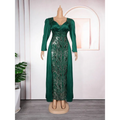 Plus size long sleeve sequined evening dress in emerald green satin with flowing pattern on the bodice