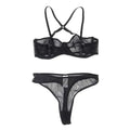Plus size mesh lingerie set in black sheer fabric with crossed-back straps and garter belts thong bottom shown from back