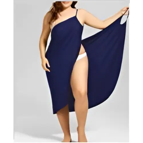 Plus size suspenders beach skirt in navy blue flowing fabric with one shoulder cover and high slit design