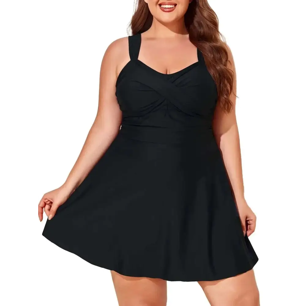 Black plus size one-piece swimsuit with draped front and flared skirt for plus size bathing and size two piece sets