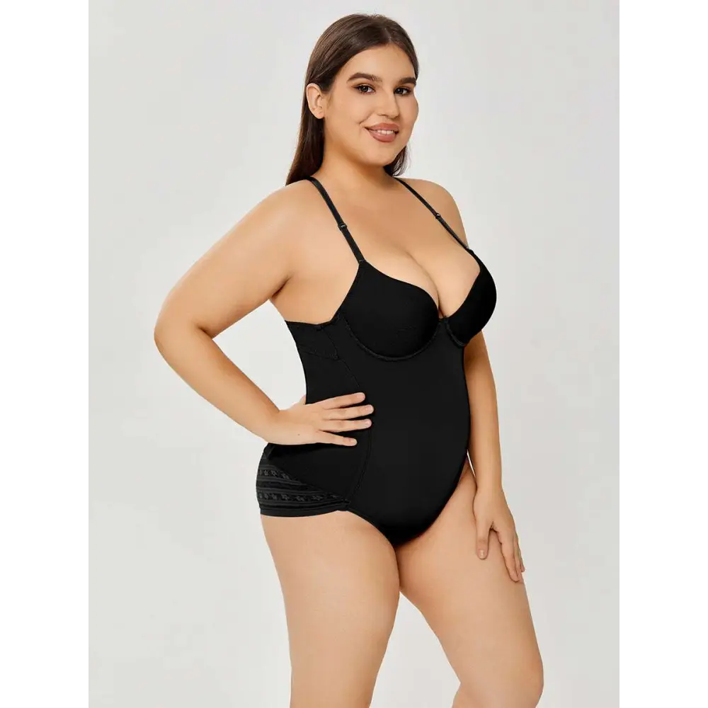 Black plus size ultra firm control body shaper swimsuit with thin straps and lace trim for a flattering fit