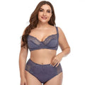 Plus size underwire navy blue lace trim lingerie set with bra and high-waisted briefs in a matching design
