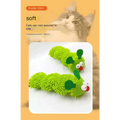 Plush catnip caterpillar toy in green with fuzzy texture, embroidered eyes, and red nose as a friendly caterpillar pet toy