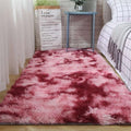 Plush gray shaggy carpet floor mat featuring a plush shaggy texture with gradient pink and deep red hues