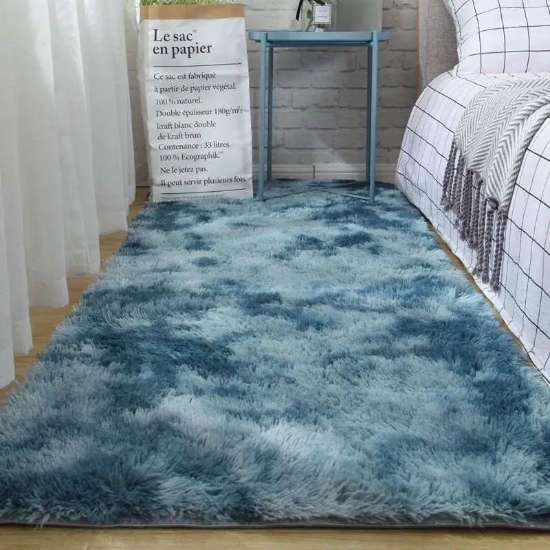 Plush gray shaggy carpet floor mat with a soft fluffy texture and blue gradient color transitions from light to dark blue